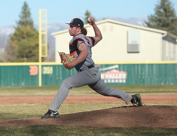 Douglas High’s Aaron Tekansik throws a pitch against Galena this spring. Tekansik was one of three area athletes chosen as a Joshua L. Anderson Memorial scholarship recipient.