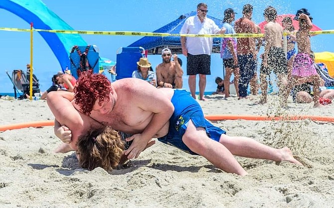 Dominic Porter wrestles at the Carolina Beach National Wrestling Tournament in mid-May. Porter qualified for the Beach Wrestling World Championships in Greece in September.