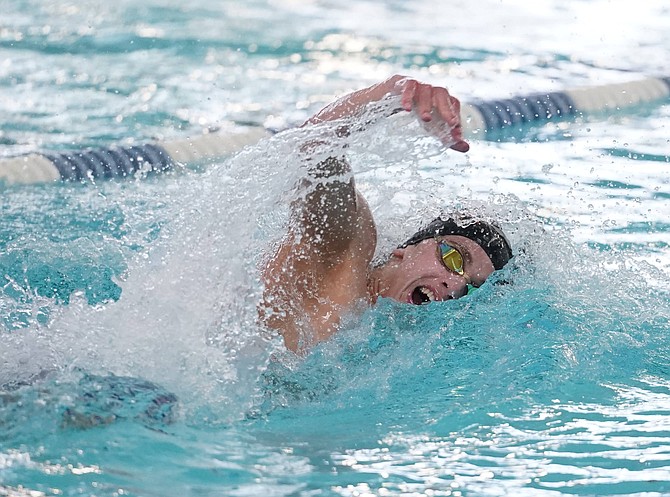 Douglas High’s Matthew Sutton competes in the 100-yard freestyle, during the Class 5A North regional trials. Sutton, a sophomore, earned all-region selections in multiple events this spring.