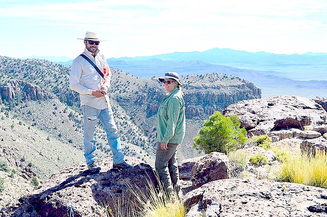 Lucas Phipps and Tamzen Stringham take a break at Golden Gate Range, within the Basin and Range National Monument, while working on their project to improve mapping of vegetation in remote regions.  Photo by Devon Snyder.