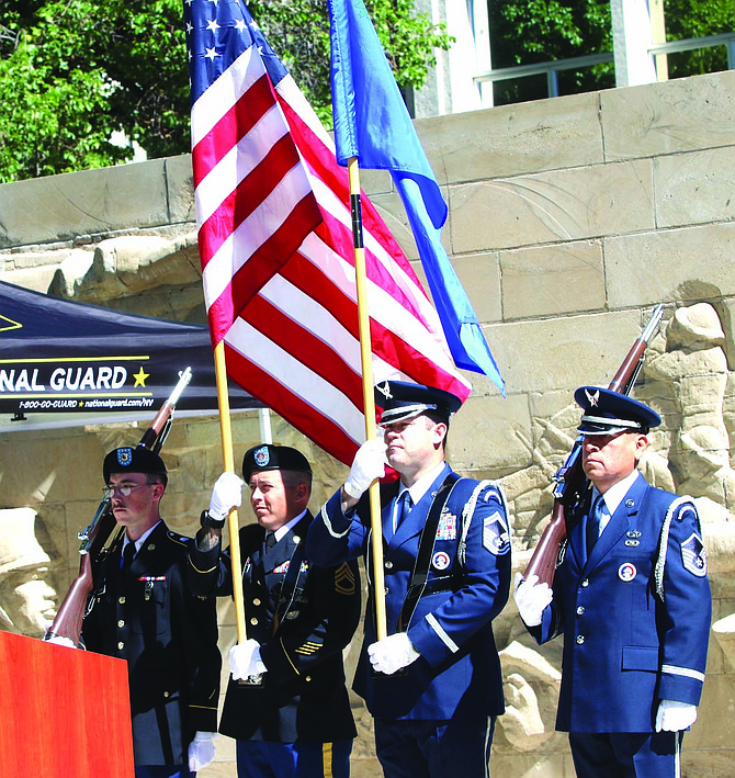 The Nevada National Guard color guard stands at attention before posting the flags at a prior Flag Day ceremony in Carson City.