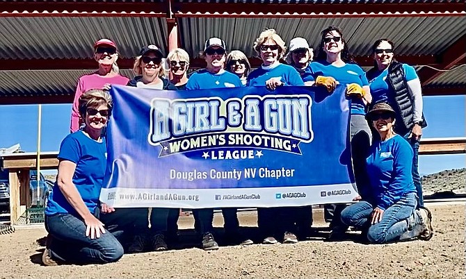 Members of A Girl & A Gun at a May 8 clean up at the Douglas Shooting Range.