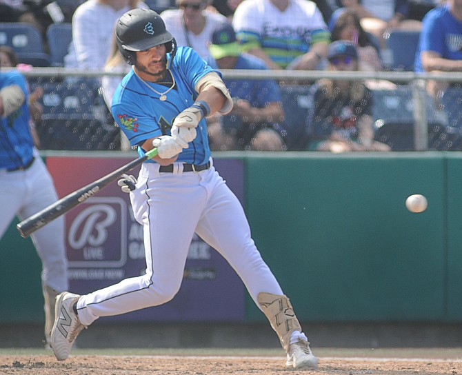 Everett AquaSox Axel Sanchez keeps an eye on the ball as he swings during an at-bat in the Sox’s 8-3 loss to the Vancouver Canadians on Sunday, June 9 on Funko Field at Everett Memorial Stadium. In front of over 3,500 fans on a warm Sunday afternoon, the Sox wrapped up a six-game series with the Canadians as they took three of the six. The Sox (26-30) were five and a half games behind the Spokane Indians which are at the top of the standings at press time on Monday. 
The AquaSox head to Oregon this week where they play a six-game series against the Eugene Emeralds. They return on Tuesday June 25 with a 12-game, two week homestand starting with the Hillsboro Hops, followed by the first-place Spokane Indians. The series with Spokane features an early day game on Thursday, June 27 that has a 12:05 p.m. start.