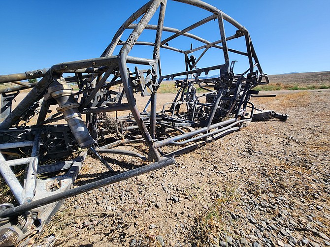 The remains of a side-by-side that caught fire and burned in the Pine Nuts northeast of Fish Springs on Saturday.