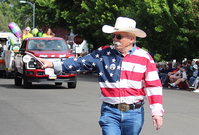 Commissioner Mark Gardner walks down Esmeralda Street during the June 8 Carson Valley Days parade, just three days before Tuesday's election.