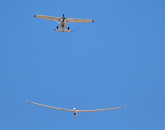 A glider competing in the 2024 Open Class Nationals is towed into the air on the last day of competition on Tuesday.