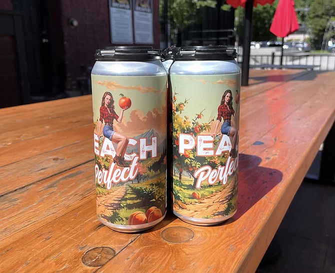 Cans of the Fox’s Peach Perfect Kettle Sour Ale, a new beer to be served at the annual Capital City Brewfest in McFadden Plaza on Saturday.