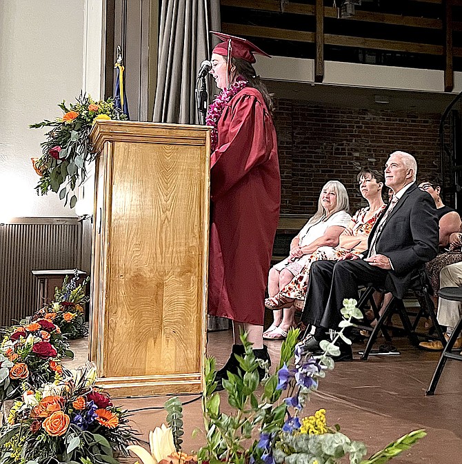 Mandy Akers speaks to ASPIRE Academy graduates on Friday.