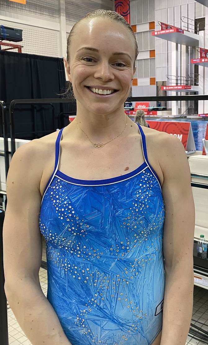 Krysta Palmer smiles on the pool deck after finishing the 2024 US Olympic Trials. Palmer was third in the 3-meter individual springboard, finishing 5.85 points off an Olympic qualification spot.