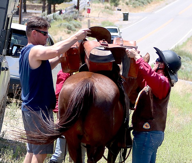 The transfer of the mochilla on Wednesday afternoon along Jacks Valley Road during the Pony Express Re-ride.