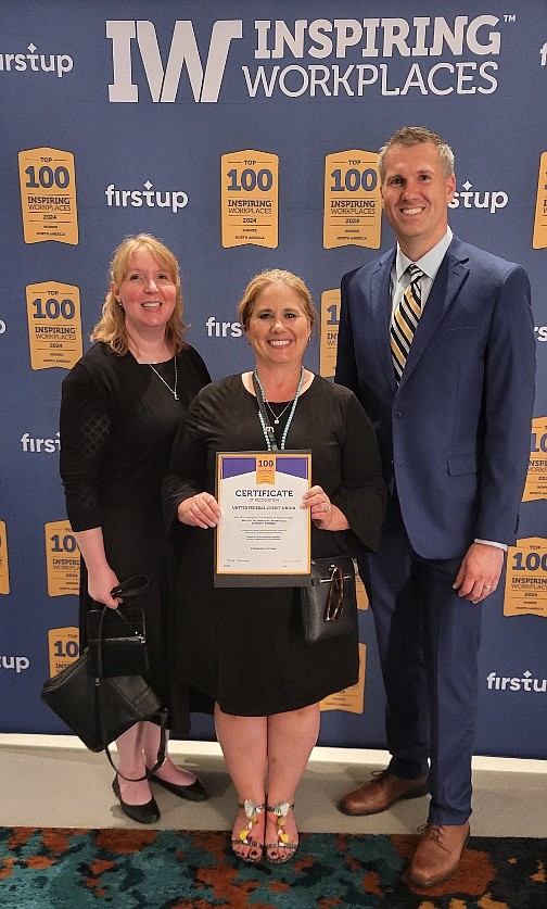 Left to right: Jennifer Wignall, Kirin Northam, and Bob Beauchamp receive United’s 2024 Top 100 Inspiring Workplaces in North America award.