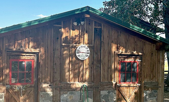 The thermometer at Rod and Joy Smith's Willow Springs Ranch near Sheridan reads 100 degrees at 5 p.m. July 7. Photo special to The R-C