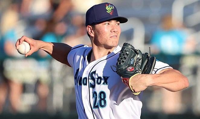 Pitcher Bryan Woo, on relief and temporarily in Everett AquaSox uniform, pitches during the July 6 game against Vancouver at Funko Field in Everett.