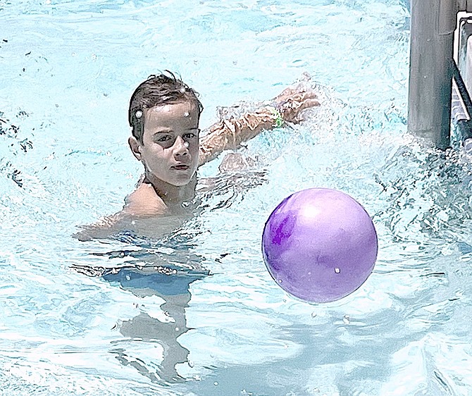 Six-year-old Brooks Middleton cools off at the East Fork Swim Center last week. Photo special to The R-C by Mary Ann Middleton