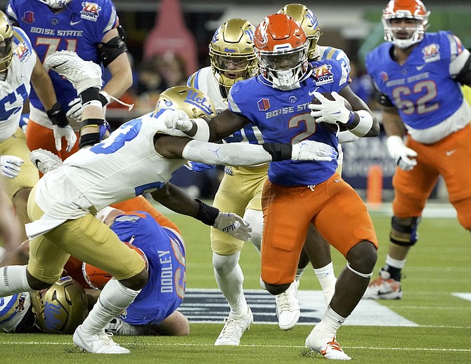 Boise State running back Ashton Jeanty (2) makes a move against UCLA during last season’s LA Bowl.