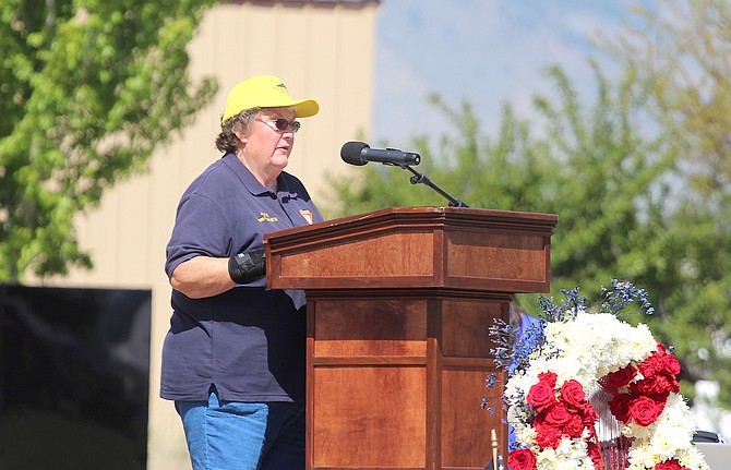 Fleet Reserve Association Auxiliary Chaplain Judy Dunn describes the history of the Vietnam Moving Wall at Eastside Memorial Park in Minden on May 24.