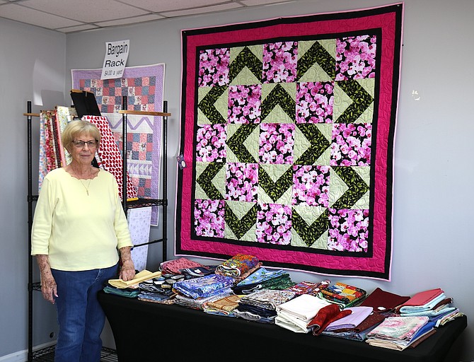 Carson City resident Judi Miller teaches one-on-one quilting at Grandma’s Fabrics, 1982 E. William St. This wall quilt was one of Miller’s creations that shop owner Jan Moritz is displaying in her store.