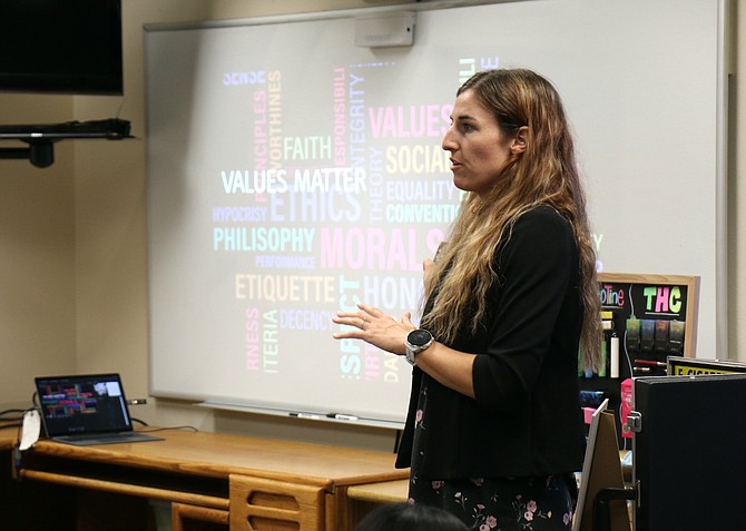 Michelle Entz, Carson City Juvenile Services outreach specialist, gives a presentation July 19, 2023, on high-risk youth behavior.