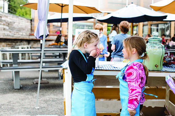 Seattle kids get excited when they earn their first dollar and start to build their business experience at their first lemonade stand.