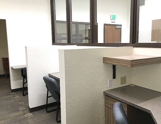 Kiosks located on the second floor of the Judicial & Law Enforcement Center await computers the public can use to access court files.