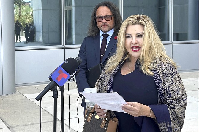 Michele Fiore speaks to reporters outside U.S. District Court in Las Vegas on July 19, 2024 with her attorney Michael Sanft.