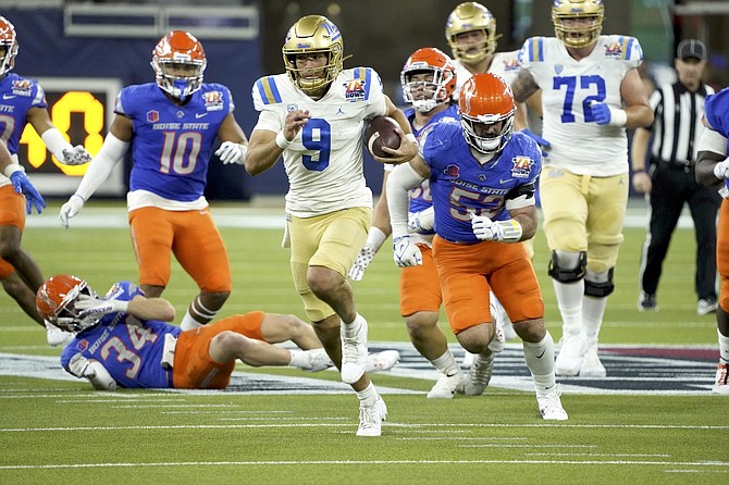 Boise State was hammered in its most recent outing, losing 35-22 in the L.A. Bowl to Collin Schlee (9) and his UCLA teammates.