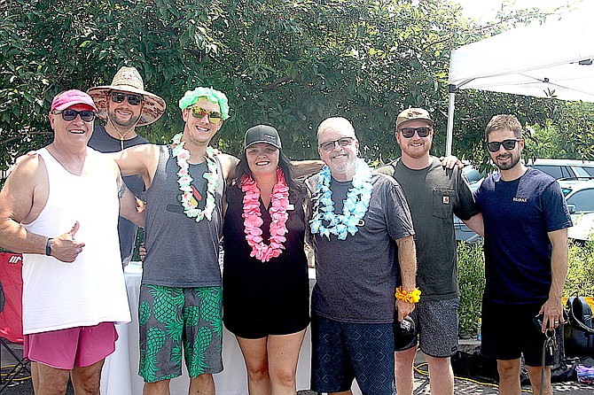 Coldwell Banker Select Danny Villalobos, Mason McDuffie Mortgage’s Brandon Huff, Carson Valley 20/30 Club’s Robbie Boulais, Stewart Title Branch Manager Brandi Alley, Intero Real Estate’s Ron McBryde, eXp Reality’s Michael Koerner, and RE/Max Gold’s Nick Phillips were of the 15 who were dunked during the Dunk for Charity event Friday in support of Suicide Prevention Network.