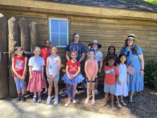 Symphony Youth Chorus with Director Nancy Jones on July 4 in Genoa.