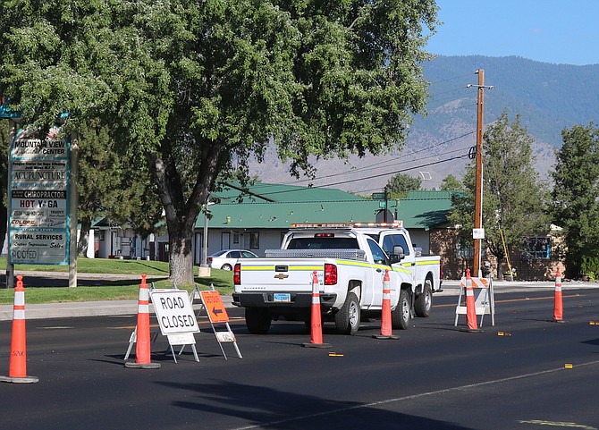 There was asphalt on both sides of Highway 395 on Thursday morning as most of the work turns from digging up pavement to laying it down.