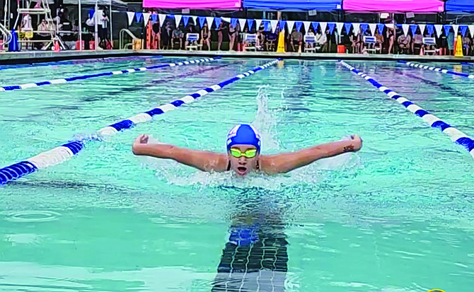 Saige Bakker swims at the Silver State Championships in Reno