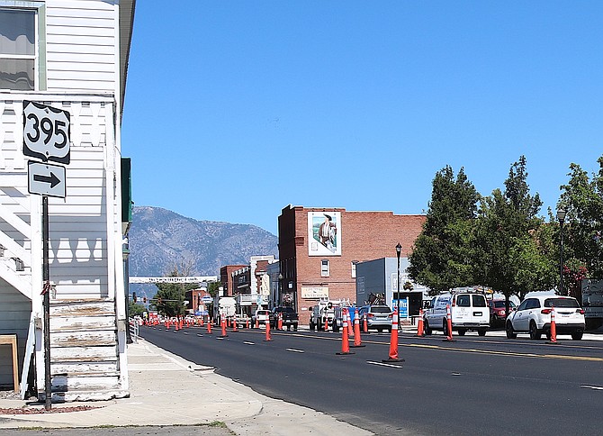 Traffic stops for the signal at Main Street and Gilman Avenue in downtown Gardnerville on Monday.