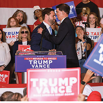 Republican vice president candidate J.D. Vance, left, greets Sam Brown, Nevada GOP candidate for U.S. Senate during a rally in southern Nevada last month.