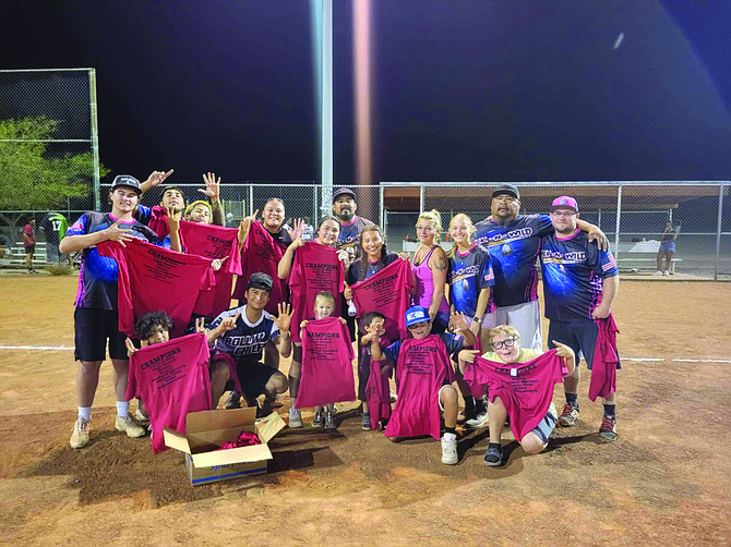 Thick N Wild players hold up six fingers for their sixth LSA title. From left to right- Ethan Rhodes, Brian Smokey, Kaden Chambers, Trenton Rhodes, Alyssa Smokey, Itatty Espinoza, Morgan Reid, Sam Tomaro, Taylor Garland, Tim Rhodes and Jared Jensen.