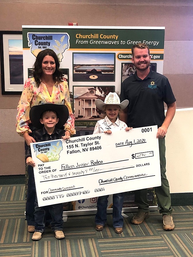 Fallon Junior Rodeo representatives accept a $2,070 sponsorship from Churchill County. From left are rodeo secretary Jennifur Peek, Quentin Peek, 2023 Queen Evva Brown and Commissioner Myles Getto.