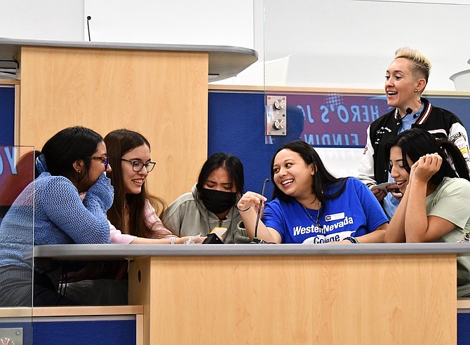 Catalina Wilson, Western Nevada College student government president for 2024-25, leads a group of students in a song for CoolSpeak presenter Laura Rizo, right, on Aug. 6, 2024 in Marlette Hall.