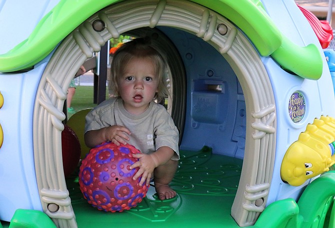 Cove Malmed, 1, plays in a structure at the Boys and Girls Clubs of Western Nevada’s new Thompson Center Smart Start during its grand opening Aug. 9, 2024.