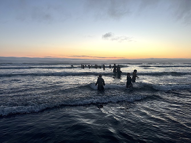 All About Dance dancers ran into the ocean off the Oregon coast dressed in full costume after winning the Grand Championship trophy for their production “The Curse of the Black Pearl,” at the Spotlight Dance Cup in Seaside, Ore., in July.