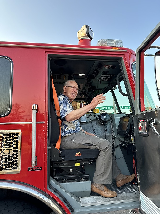 Courtesy
Rotarian Walt Zierman enjoys the view from the cab of the fire truck.