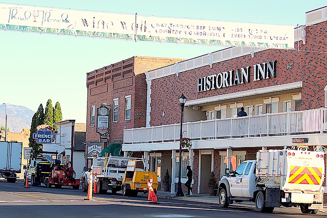 Three Nevada Department of Transportation vehicles and the many orange cones guiding motorists were the only signs of work in downtown Gardnerville around 8 a.m. Thursday.