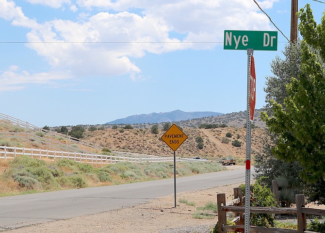 Douglas County delayed approval of an ordinance that would close Johnson Lane above Nye to trucks.