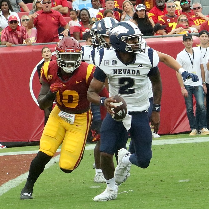 Brendon Lewis, shown last year against USC, has been announced as Nevada’s starting quarterback to open the 2024 season.