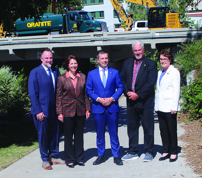 The Arlington Bridges Project in Reno will replace two bridges. Those attending Tuesday’s ceremony include, from left: Reno Councilman Devon Reese, U.S. Sen. Catherine Cortez Masto, U.S. Transportation Secretary Pete Buttigieg, Sparks Mayor Ed Lawson and U.S. Sen. Jacky Rosen.