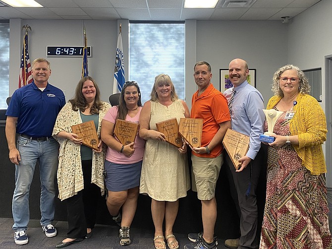 From left, Carson City School District educators Josh Billings, Kirstin Kolstad, Evelyn Grime, Kasey Kemmet, Senior Chief Jerry Skirvin, Charlie Mann and Candi Robles at the Aug. 13 Carson City School Board meeting.