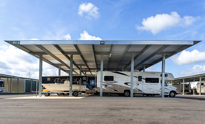 Courtesy KLS Planning and Design Group and Monte Vista Consulting, a picture from a Planned Unit Development application showing a typical storage canopy for RVs and boats.