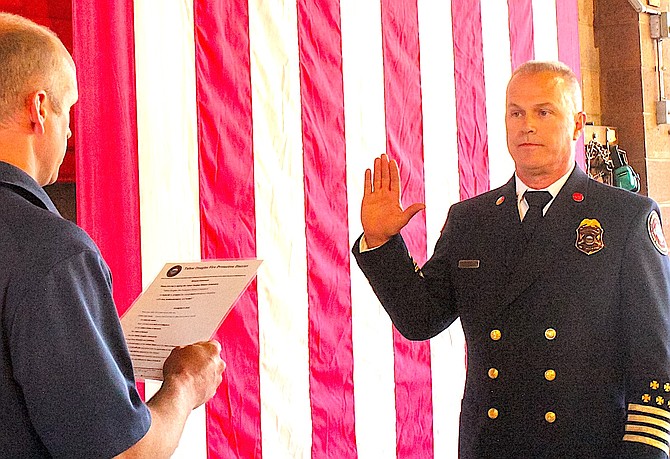 Gardnerville resident Kevin Lawson is sworn in Aug. 21 as the new assistant chief of special operations for the Tahoe-Douglas Fire Protection District.