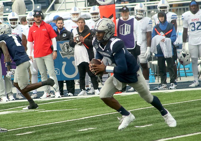 Nevada quarterback Brendon Lewis led the Wolf Pack in both rushing (77 yards) and passing (132) on Saturday against SMU.