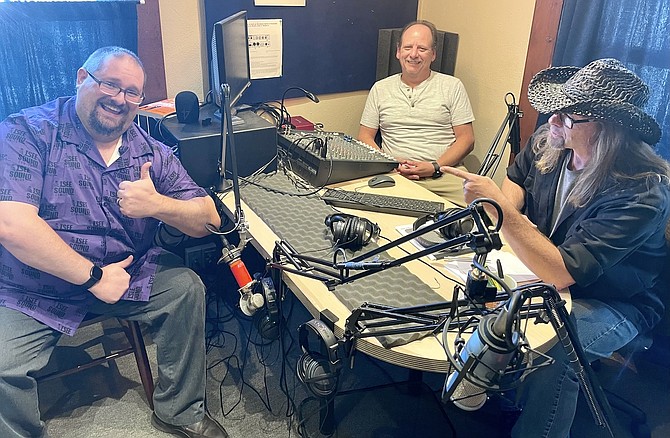 From left, Mark Helton, CEO and cofounder of 97toNow Productions, Robb Nault and Jimmie Jones, co-hosts of Pop Culture Kaboom Radio Show on KNVC 95.1 FM, at the radio station in west Carson City on Aug. 27.