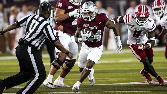 Troy running back Damien Taylor (24) runs against Louisiana last season. He is the Trojans’ leading returning rusher.