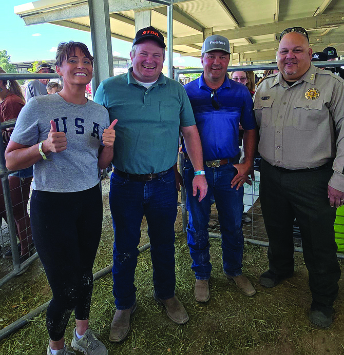 Kiss the Pig candidates, from left: Taryn Lenon, Matt Louie, Jesse Segura and Lee Orozco.