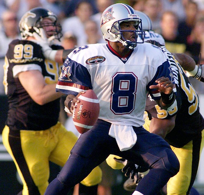 Legendary Georgia Southern quarterback Tracy Ham, shown playing for the Montreal Alouettes in a CFL game, led the Eagles to Division I-AA titles in 1985 and 1986. He had a hand in four touchdowns during Georgia Southern’s win over Nevada in the 1986 semifinals.